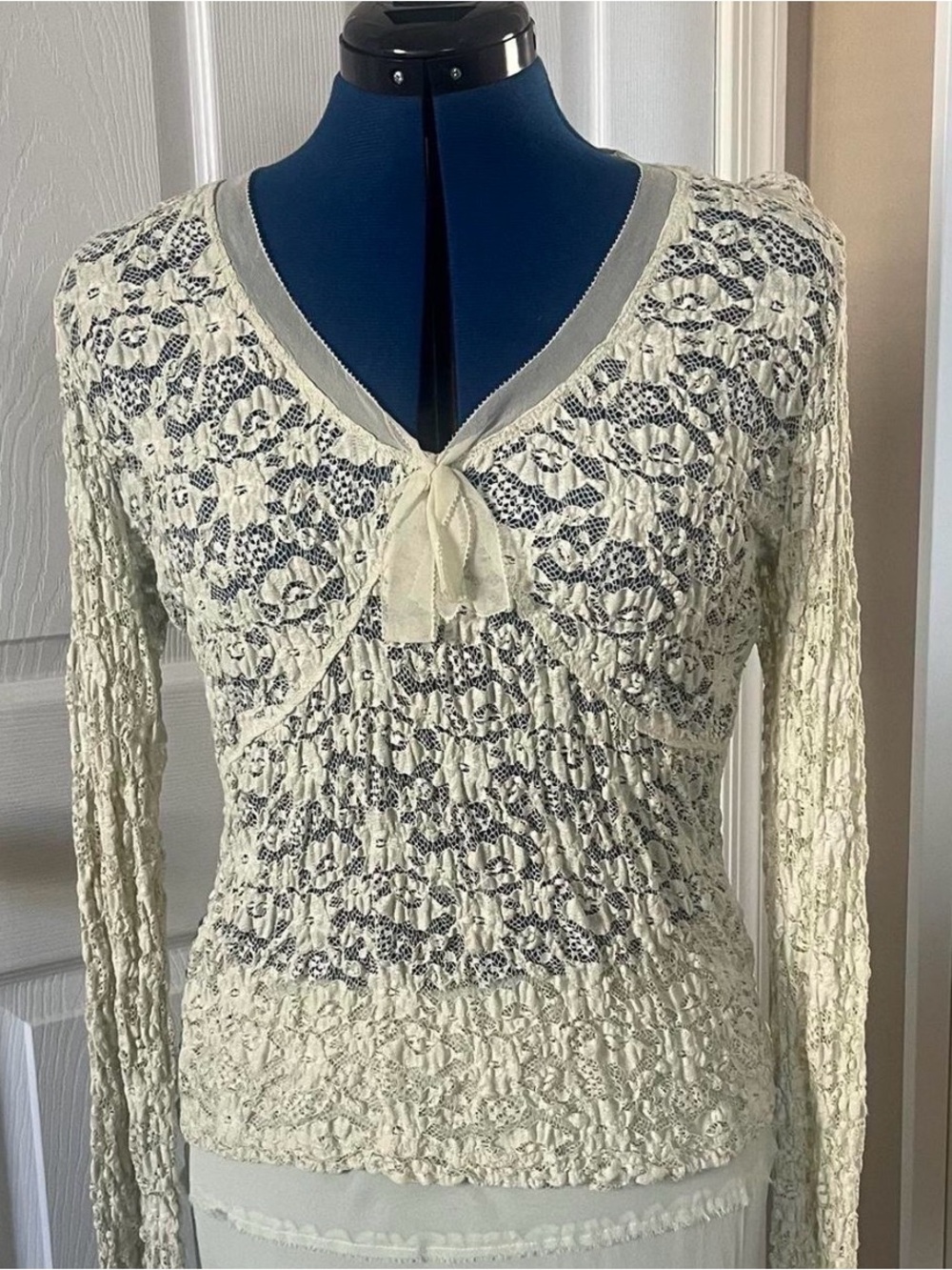 Calvin Klein stretchy mint green lace top with tie neck  and extra long sleeves